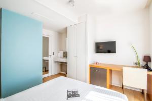 Un pat sau paturi într-o cameră la Hotel Itsas Mendia