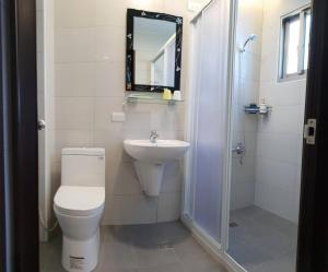 Koupelna v ubytování JiuZhiAn Apartment + 16 fotografií