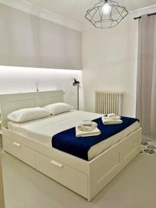 En eller flere senge i et værelse på Porta San Biagio Rooms