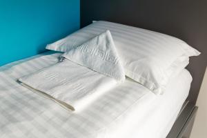 Letto o letti in una camera di Freinest Wien