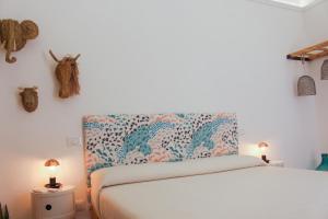 Postel nebo postele na pokoji v ubytování Casa MaHe