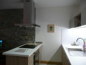 Kuchyň nebo kuchyňský kout v ubytování La Porte du Paradis