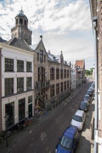 a car is parked in front of a building at Citystays Deventer in Deventer