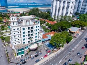 an aerial view of a building in a city at Golden View Serviced Apartments in George Town