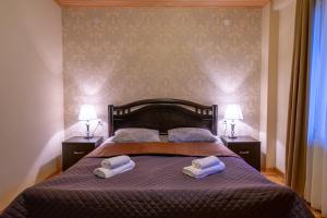 Letto o letti in una camera di Guesthouse David Zhorzholiani