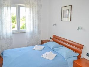 Postel nebo postele na pokoji v ubytování Apartment Jadranka-2 by Interhome