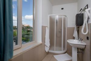 Kúpeľňa v ubytovaní Porta Pispini Residence