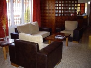 Posezení v ubytování Hostal Siete Picos