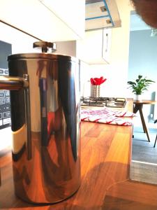 a metal coffee pot sitting on a kitchen counter at No 20 City Central Flat in Norwich