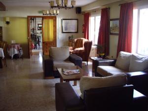 Posezení v ubytování Hostal Siete Picos