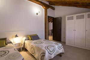 Cama o camas de una habitación en Casa Barrena