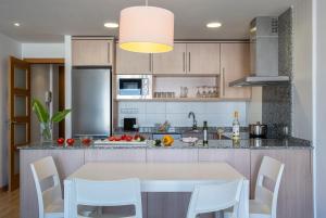 Кухня или мини-кухня в Pierre & Vacances Empuriabrava Marina
