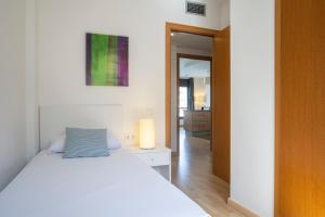Кровать или кровати в номере Pierre & Vacances Empuriabrava Marina