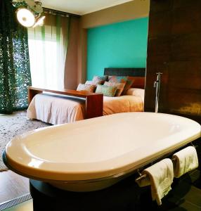 Posteľ alebo postele v izbe v ubytovaní Hotel Aguadoce - Louzao