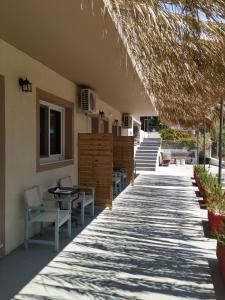 Balkón nebo terasa v ubytování Pessada Bay Studios and Apartments