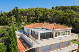 an aerial view of a house with a roof at Secret Escape Penthouse in Slatine