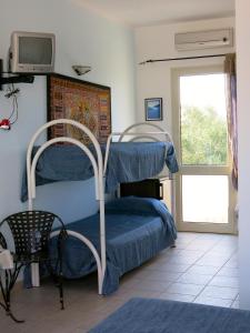 Posteľ alebo postele v izbe v ubytovaní Agriturismo Tenuta Del Morige