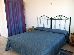 Posteľ alebo postele v izbe v ubytovaní Agriturismo Tenuta Del Morige