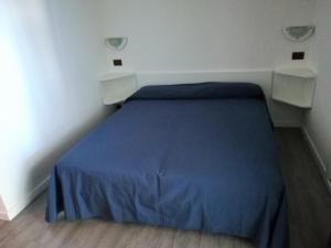 Postel nebo postele na pokoji v ubytování Hotel Friuli