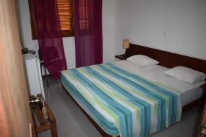 Posteľ alebo postele v izbe v ubytovaní Guest House Soncent