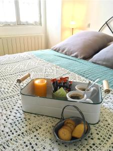 Ein Bett oder Betten in einem Zimmer der Unterkunft L'Atelier de Tess