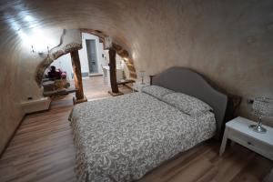 Giường trong phòng chung tại Residenza Vecchi Tempi