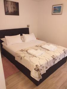 Postel nebo postele na pokoji v ubytování Apartments & room Ivica Split