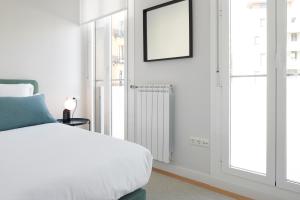 Posteľ alebo postele v izbe v ubytovaní Muinoa 5 by FeelFree Rentals