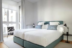 Posteľ alebo postele v izbe v ubytovaní Muinoa 5 by FeelFree Rentals