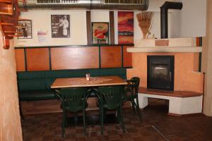 Posedenie v ubytovaní Gasthof-Cafe-Risano