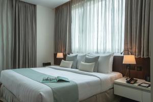 Katil atau katil-katil dalam bilik di Residence26