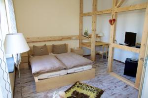 Tempat tidur dalam kamar di Landhaus-Püttmann