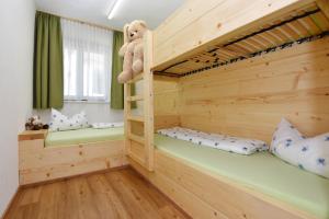 A bed or beds in a room at Mottnerhof