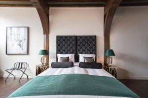 Katil atau katil-katil dalam bilik di Boutique Hotel Steenhof Suites - Adults Only