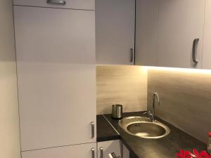 Kuchyňa alebo kuchynka v ubytovaní Apartament Lucky + 37 fotografií