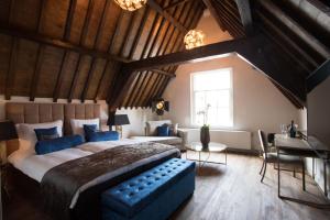 Katil atau katil-katil dalam bilik di Boutique Hotel Steenhof Suites - Adults Only