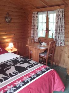 Postel nebo postele na pokoji v ubytování Chalet Le Paradou Adults only