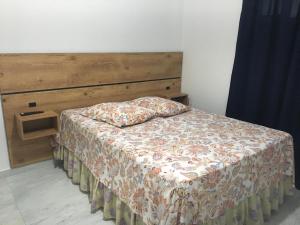 Postel nebo postele na pokoji v ubytování Pousada Maria Helena