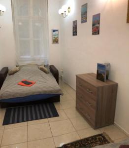 A bed or beds in a room at Urania