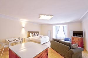 Łóżko lub łóżka w pokoju w obiekcie Stylische Cityapartments Benedikt
