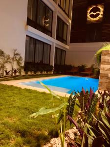 Bazén v ubytování Hotel Muyu Tulum nebo v jeho okolí