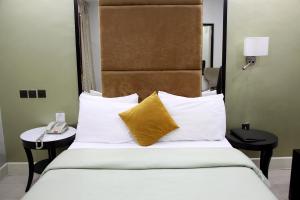 Ένα ή περισσότερα κρεβάτια σε δωμάτιο στο BW Starfire Hotel