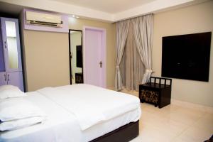 Ένα ή περισσότερα κρεβάτια σε δωμάτιο στο BW Starfire Hotel