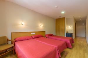 Postel nebo postele na pokoji v ubytování Hotel Costa