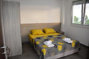 Postel nebo postele na pokoji v ubytování Apartment EMA