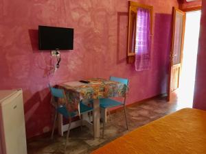 TV a/nebo společenská místnost v ubytování B&B Villa Carla