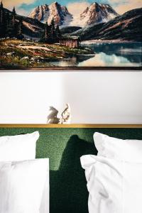 Voodi või voodid majutusasutuse Experimental Chalet toas