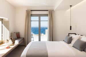 Cama ou camas em um quarto em Mykonos Soul Luxury Suites