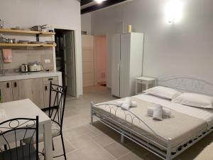 Postel nebo postele na pokoji v ubytování Apartments Rita
