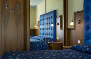 Postel nebo postele na pokoji v ubytování Hotel Panoramic